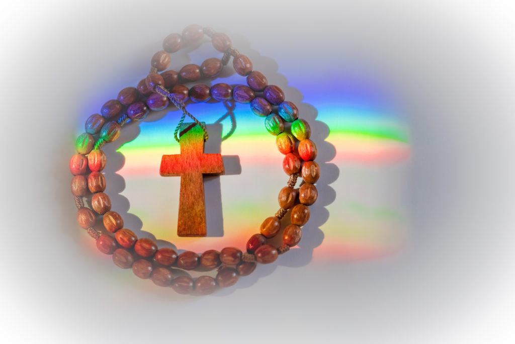 rosary overcome by rainbow